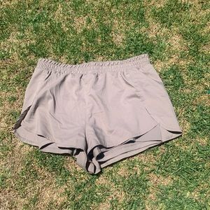 Girlfriend collective tan shorts